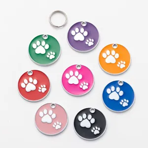 Colorful metal dog tags pet ID tags with cute paw print design, durable zinc alloy material.