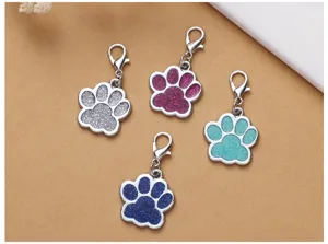Zinc alloy glitter pet paw ID tags with secure lobster clasps for small dogs and cats.