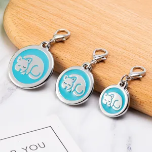 Metal pet ID tag with blue epoxy sleeping animal design and lobster clasp, multi-size.
