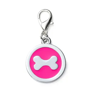 Silver metal round dog tag keychain with pink enamel and cute bone charm pendant main view