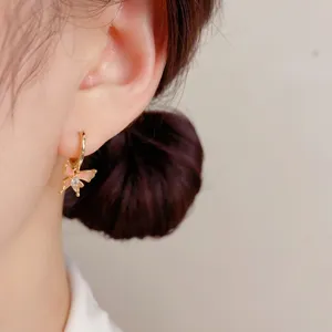 Charming gradient butterfly hoop earrings for women, sweet and elegant fashion jewelry detail.
