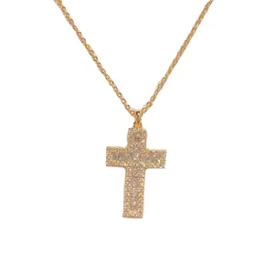 Elegant gold-plated cross pendant necklace sparkling with micro zircon stones for women and girls.