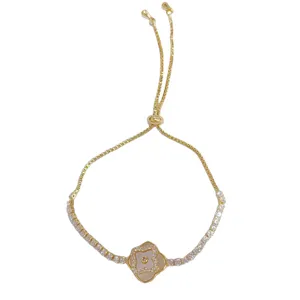 Gold four leaf clover slider bracelet with mother of pearl and crystal charms for women fashion.