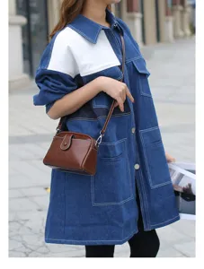 Stylish women brown leather crossbody bag with minimalist design for daily fashion use.