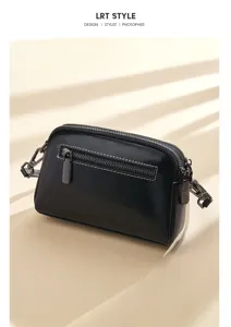 Elegant black leather crossbody bag for women, minimalist daily shoulder bag with zippers.
