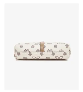Detailed bottom view of the elegant beige cylindrical handbag with classic clover print.