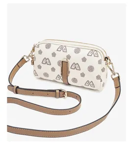 Stylish women's crossbody bag with trendy monogram pattern and chic hardware details.