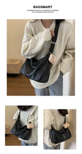 Minimalist black hobo shoulder bag for women, wide strap soft leather vintage underarm bag.