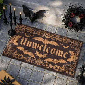 Paillasson Halloween avec motif de chauve-souris et texte unwelcome pour votre entrée.