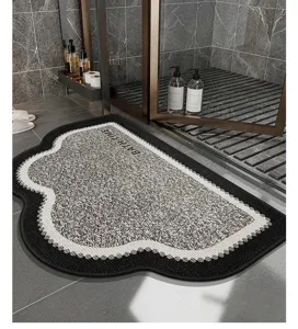 Absorbent non-slip bath mat for bathroom doorway, modern black and white textured floor carpet.