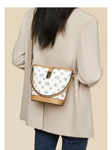 Stylish women bucket shoulder bag with retro monogram print and chic brown trim design detail.