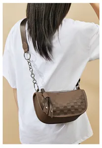 Brown leather shoulder bag with chain strap and stylish checkerboard pattern detail.