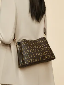 Stylish women's shoulder bag with classic monogram pattern, elegant commuter crossbody design.