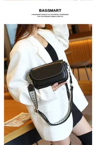 Vintage black shoulder bag for women, stylish crossbody bag with wide embroidered strap, casual.