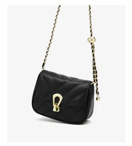 Black quilted leather crossbody bag with chic gold chain strap and metal lock detail for women.
