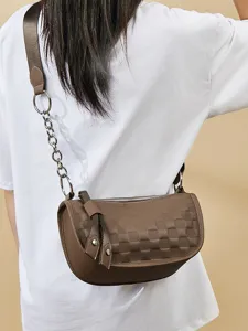 Brown leather checkered shoulder bag for women, stylish crossbody pillow bag with chain strap.