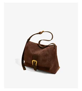Brown suede shoulder bag with a gold buckle, elegant retro crossbody bag for daily wear.