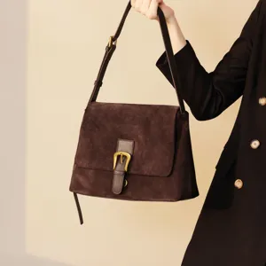 Dark brown suede shoulder bag for women, elegant vintage crossbody bag with metal buckle.