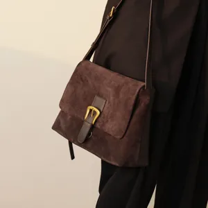 Women's autumn winter suede crossbody shoulder bag elegant brown leather bag main view display.