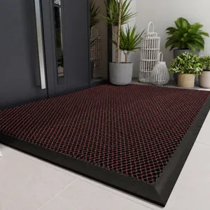 Textured anti-slip doormat detail, durable nylon and PVC loop wire for home porch.