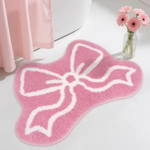 Roze strik pluche vloermat schattig zacht absorberend tapijt voor slaapkamer badkamer