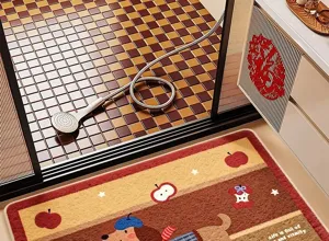 Absorbent bathroom floor mat with cute cartoon dog and apple pattern, soft faux cashmere.