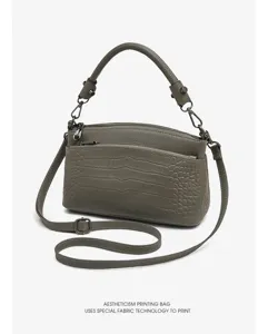 Genuine leather cowhide women shoulder crossbody bag with multi compartments and alligator pattern.