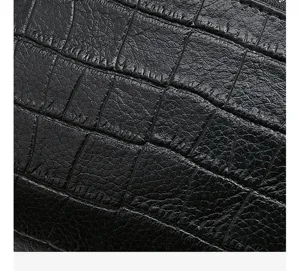 Genuine top layer cowhide leather handbag detail view, showing exquisite crocodile texture.
