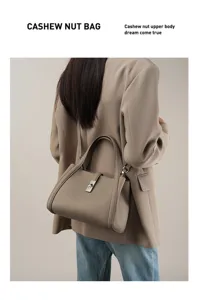 Stylish women leather shoulder bag top handle crossbody casual commuter handbag with lock.