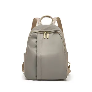 Zaino casual grigio leggero da donna, versatile borsa da viaggio per il lavoro quotidiano.