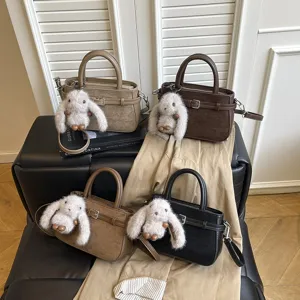 Women PU leather handbag retro casual shoulder crossbody bag with cute plush bunny charm autumn style.