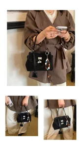Elegante schwarze Wildleder Handtasche für Damen, Freizeittasche mit Drehverschluss Perlen.