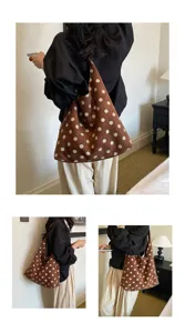 Brown polka dot canvas shoulder bag detail view, casual large capacity tote for daily commute and summer.