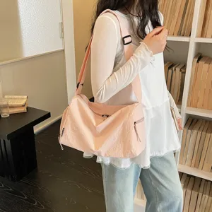 Roze lichtgewicht schoudertas grote capaciteit casual crossbody reizen fitness tas dames.