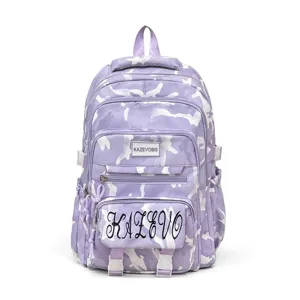 Purple camouflage student backpack with multiple pockets and casual style for women daily travel.