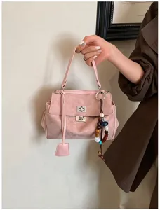 Rosa Wildleder Handtasche für Damen, elegante Umhängetasche mit perfektem Design.