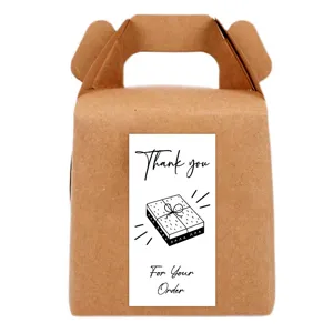 Kraft paper gable gift box featuring a minimalist black and white thank you sticker for packaging.