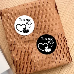 Minimalist round thank you stickers with heart design, perfect for baking sealing and packaging.