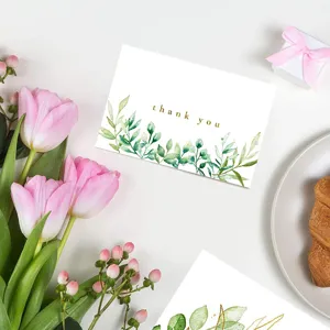 Detailansicht der grünen botanischen Dankeskarte mit Aquarellblattillustration und Text.