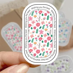 Floraler dekorativer Siegelaufkleber, ovales Design mit Text für schöne Geschenkverpackung.