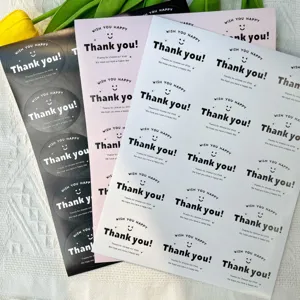 Detailed close-up view of elegant oval thank you sticker sheets in multiple colors.