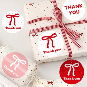 Round thank you sealing stickers with cute red bows and polka dot patterns for gift wrapping.
