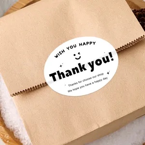 Black oval thank you sticker for gift packaging, baking sealing, decorative adhesive label.
