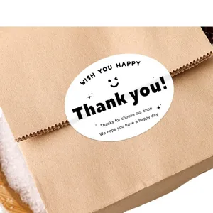 Black oval thank you sticker, decorative sealing label for gift baking packaging and dessert boxes.
