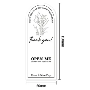 Detailed view of arch floral sticker design, dimensions 150x60mm for gift sealing.