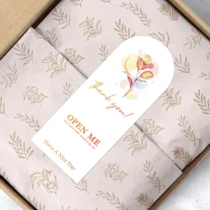 Decorative floral sealing stickers in gift box, elegant arch label design for gift packaging.