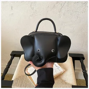 Close up of creative black elephant shaped PU leather handbag with cute design and shoulder strap.