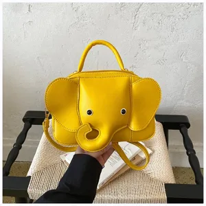 Close-up of cute yellow elephant handbag, creative animal design PU leather cross body bag.
