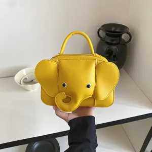 Yellow cute cartoon elephant shape handbag, stylish PU leather crossbody purse for women.