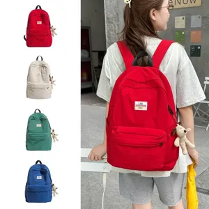 Große Kapazität Canvas Rucksack Damen, lässige Schultasche mit süßem Welpen Anhänger.